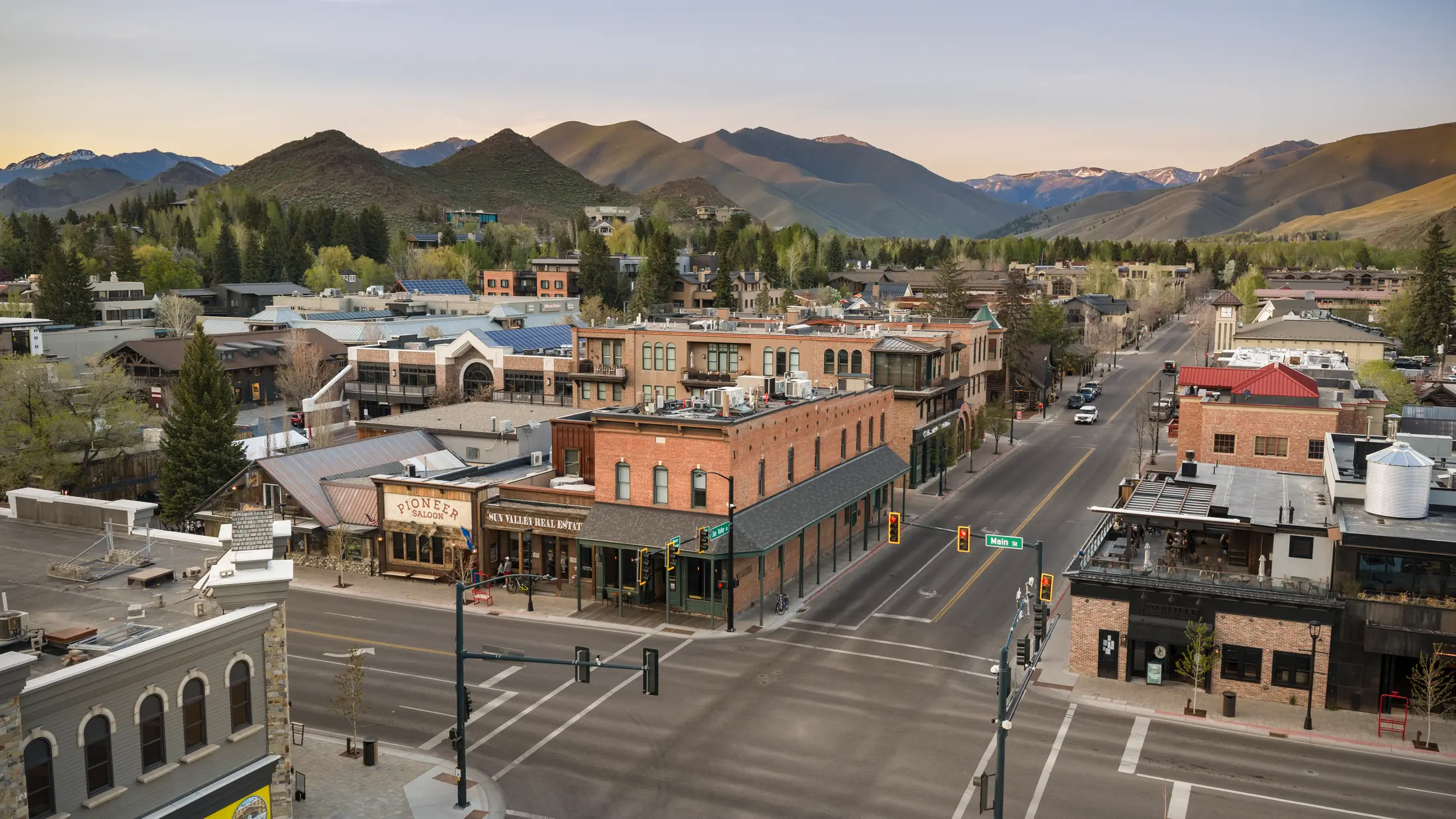 An aerial view of Main Street in downtown Ketchum with mountains beyond.